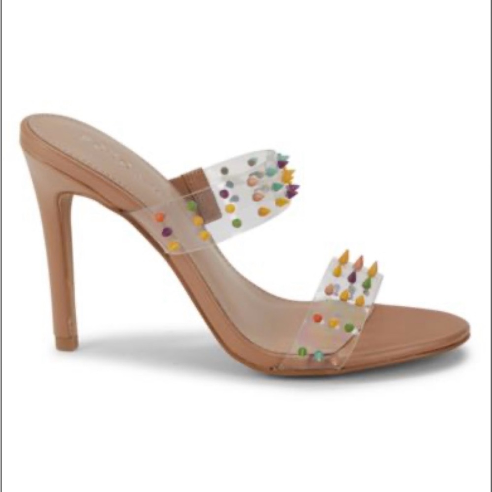 Colorful studs on the dual transparent straps enliven these sandals.